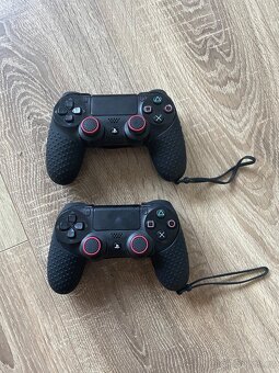 PlayStation 4 dva ovladače + hry - 2