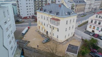 Pronájem bytu 1+kk s možností parkování a vl. vytápěním. - 2