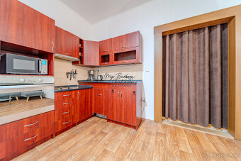 Prodej krásného bytu 2+kk s předzahrádkou a zahradou v ul. E - 2