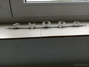 Chromovaný nápis na Škoda 100,110 - 2