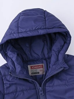 Tmavomodrá prošívaná bunda. Velikost 140 - 2