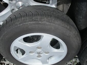 ALU kola PEUGEOT 4x108 5,5x14 s pneu 175/70 R14 - 2