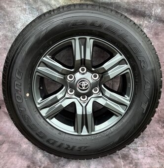 Zánovní alu Toyota Hilux 265/65R17 112S 99% VZORKU - 2