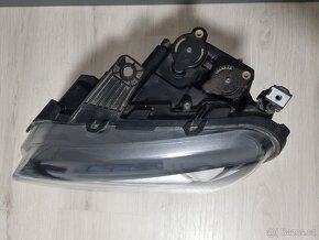 Levý přední světlomet VW Amarok - 2
