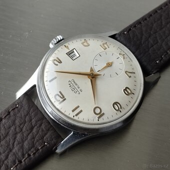 Náramkové hodinky Prim Datumatic - 2