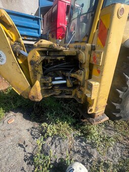 Traktorbagr komatsu wb97s porucha motoru - 2