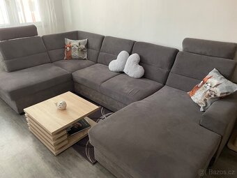Šedá rozkládací sedačka s úložným prostorem - 2