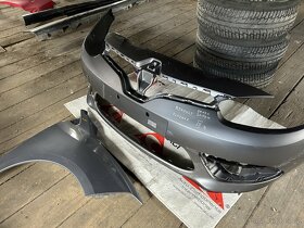 Nárazník a blatník Renault Fluence 2012/13 - 2