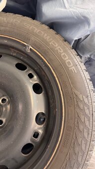 Nokian snowproof 185/60/15 s plechy na Fabia III - 2
