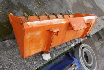 Zubovou lopatu na UNC - 2