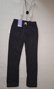 Černé zateplené kalhoty s kšandami, vel. 128 - nové - 2