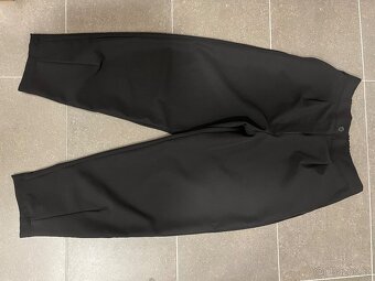 Černé kalhoty značky 3v1 - 2