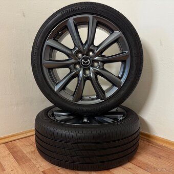 MAZDA 3 5x114,3 R18 ET45+LETNÍ 215/45R18 7,5mm - 2