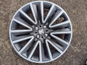 Peugeot kryty kol "16" - 2