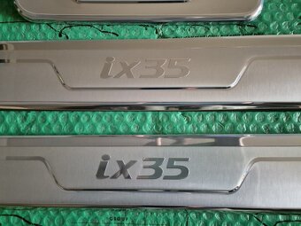 dekorativní ozdobné a ochranné lišty prahu Hyundai ix35 2S45 - 2