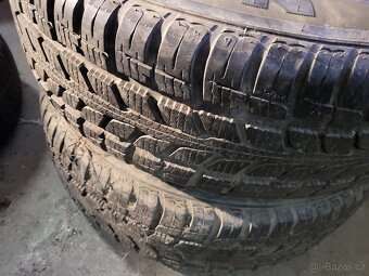 Al Kola Kia 4x114,3mm, díra 67,1mm + 205/60R15 91H - 2