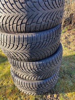 285 40 21 zimni Nokian cca 7mm - 2