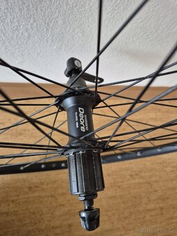 28" Zapletená kola, Shimano DEORE - 2