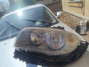 Přední světla BMW e87 - 2