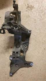 Držák příslušenství 04L903143D - E - 2