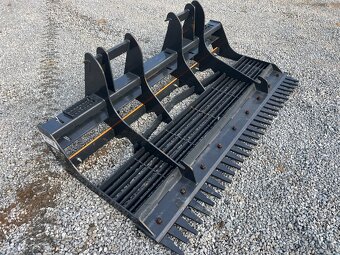 Vyrovnávací zařízení pro terén nové na smykový nakladač - 2