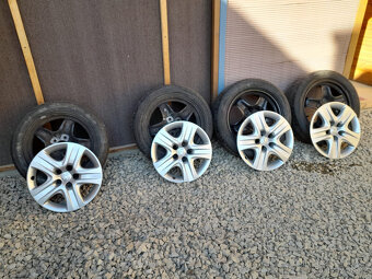 Opel-Plechove disky 17 zoll+ poklice - 2