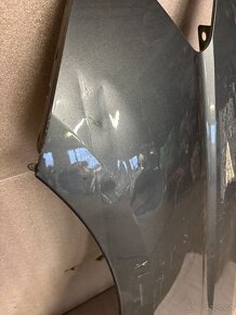 Levý blatník VW Caddy - 2