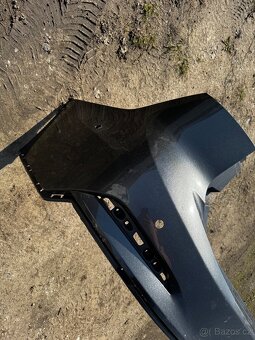 Ford Focus MK4 - zadní narazník - 2