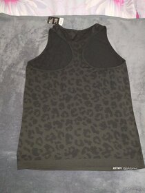 Dámský funkční bezešvý top vel. L 44/46 - 2