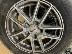 Octavia 3 5x112 zimni sada 195/65/15 - 2