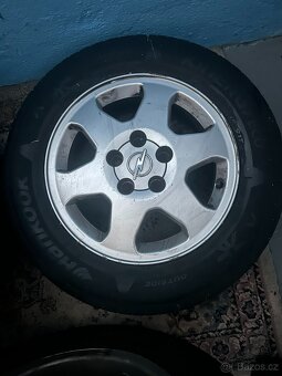 PRODÁM‼️ALU KOLA OPEL "15" 4ks ORIGINAL + pneu 195/65 R15‼ - 2