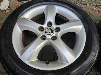 ALU kola letní Škoda 5x100 Fabia II Roomster R15 - 2