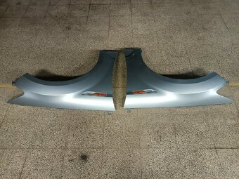 Ford Mondeo MK4 blatník přední - 2