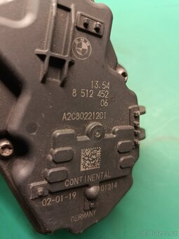Škrtící klapka BMW 13548512452 - 2