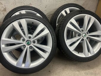 Originál alu kola Škoda Neptune R18 5x112 et51 - 2