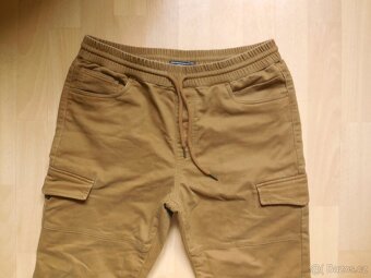 pánské Forever 21 hnědé kalhoty kapsáče joggers elast.34/29 - 2