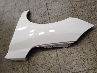 Corsa F přední blatník - 2