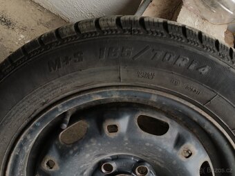 Zimní pneu s disky 165/70 r 14 z fabia 1 - 2