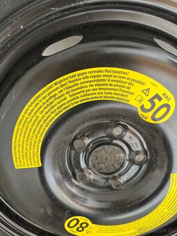 Dojezdová rezerva 125/70 R18 - 2
