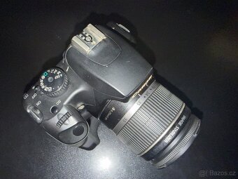 Canon EOS 1000D + EF-s 18-55 1/3.5 -. 5.6 IS + BG-E5 - 2