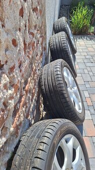prodám ALU kola včetně pneu - orig. Mazda CX-7 - 2