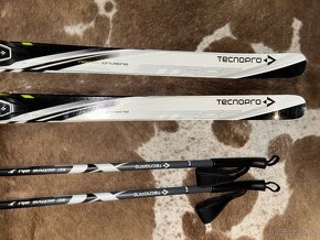 Běžky Tecno Pro 130 cm, hůlky 105 cm, boty vel.35,5 - 2