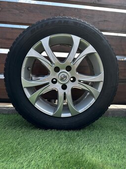 Alu kola 5x114.3 r17 s pneu (niss) - 2
