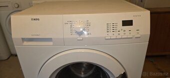 Pračka AEG L6027FL na 7 kg prádla, 1200 ot. - 2