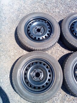 Sada kol 4x100, ET 35 vč. pneu Falken 165/70 R 14 - 2