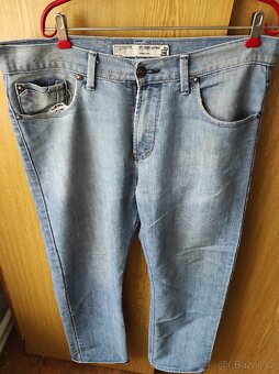 Pánské riflové kalhoty v. 38 (XL), nošené,krapet potrhané - 2