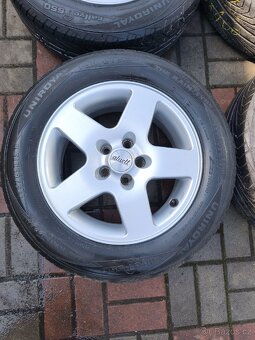 15" LETNÍ SADA KOL OCTAVIA 1 5X100 ET38 195 65 15 - 2