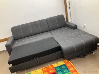Rohová textilní sedačka s uložným prostorem - 2