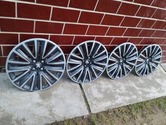 Poklice Peugeot.R/16.original. - 2