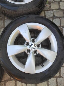 Prodám orig alu 15 škoda Fabia Rapid 5x100 ET 38 letní k. O - 2